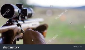 Gunman Aiming Rifle