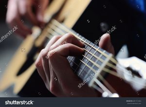 Man Playing Guitar